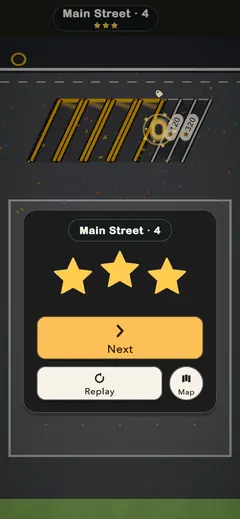 A cleared lot: three gold stars, with Next and Replay buttons.